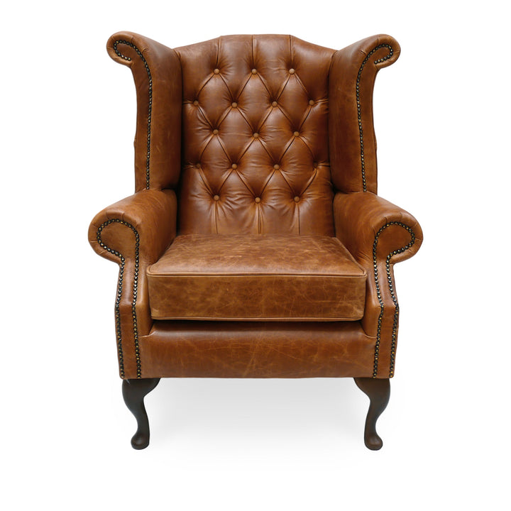 The 'Queen Anne' Vintage Leather Chesterfield Wingback Armchair and Footstool