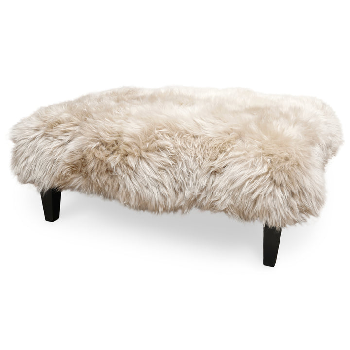 Length view of Sheepskin Footstool Coffee Table with solid hardwood legs